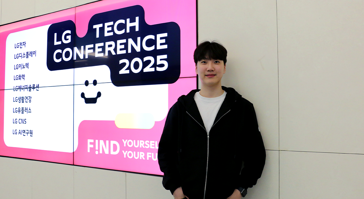 a man standing in front of a sign