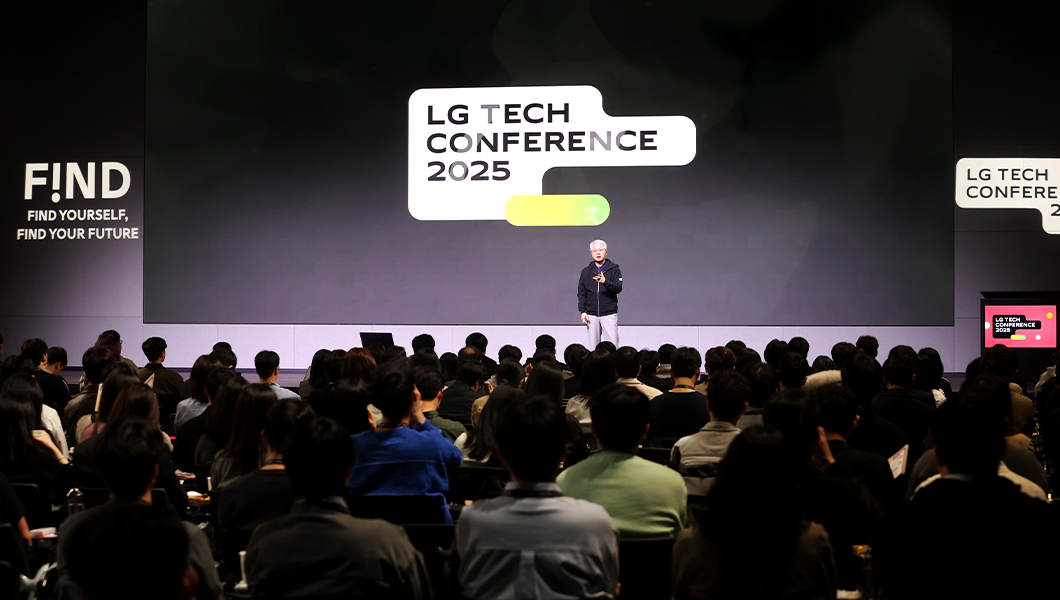 a man standing in front of a large group of people