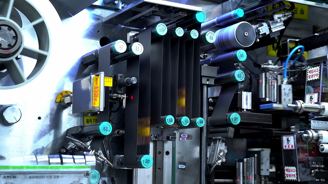 a machine with blue labels