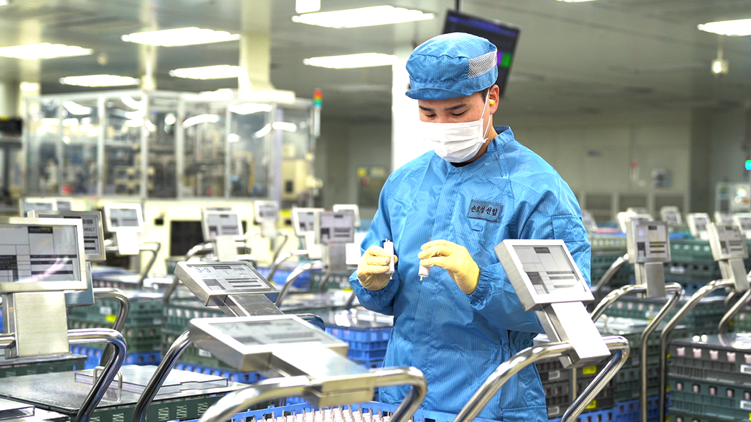 a man wearing a mask and blue uniform