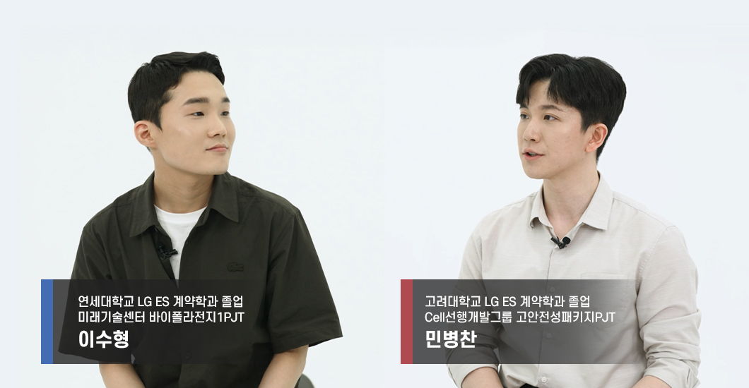 two men sitting in a chair