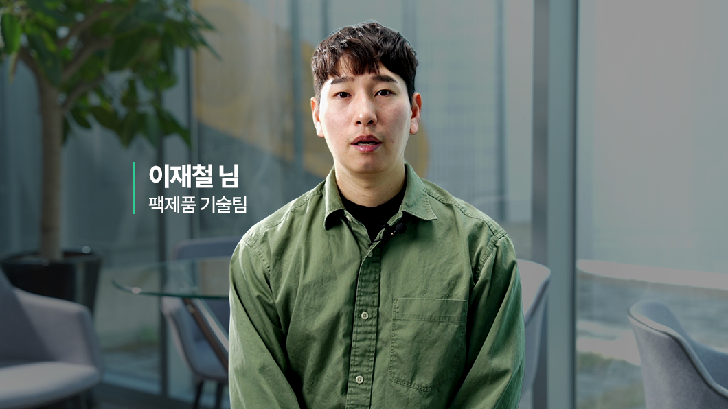 a man in a green shirt