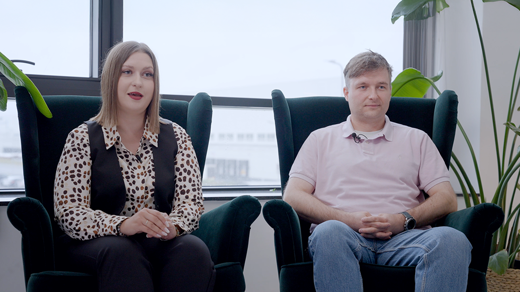 a man and woman sitting in chairs