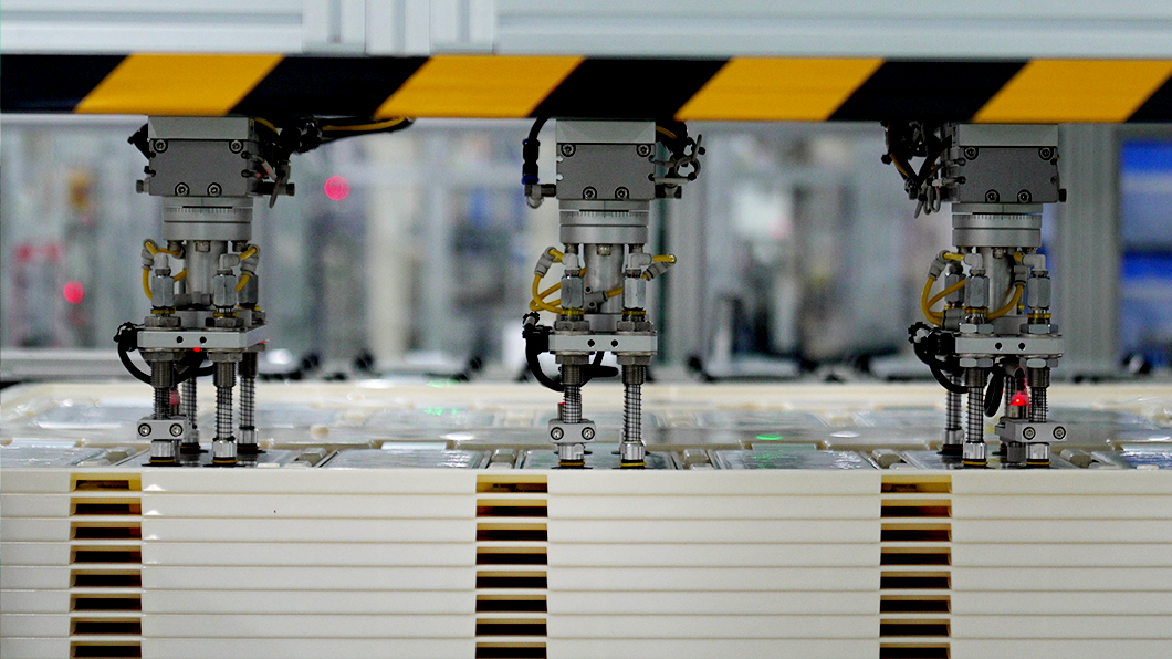 a machine with a yellow and black stripe