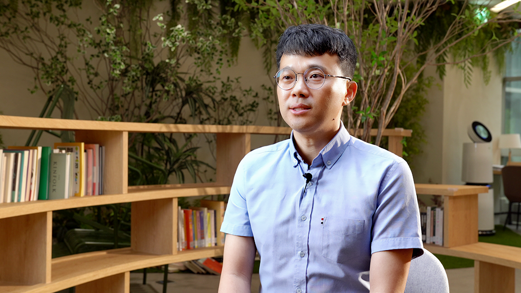 a man in a blue shirt