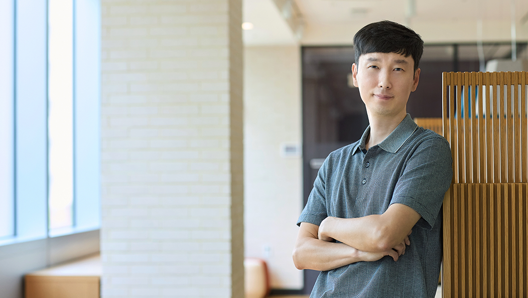 a man standing with his arms crossed